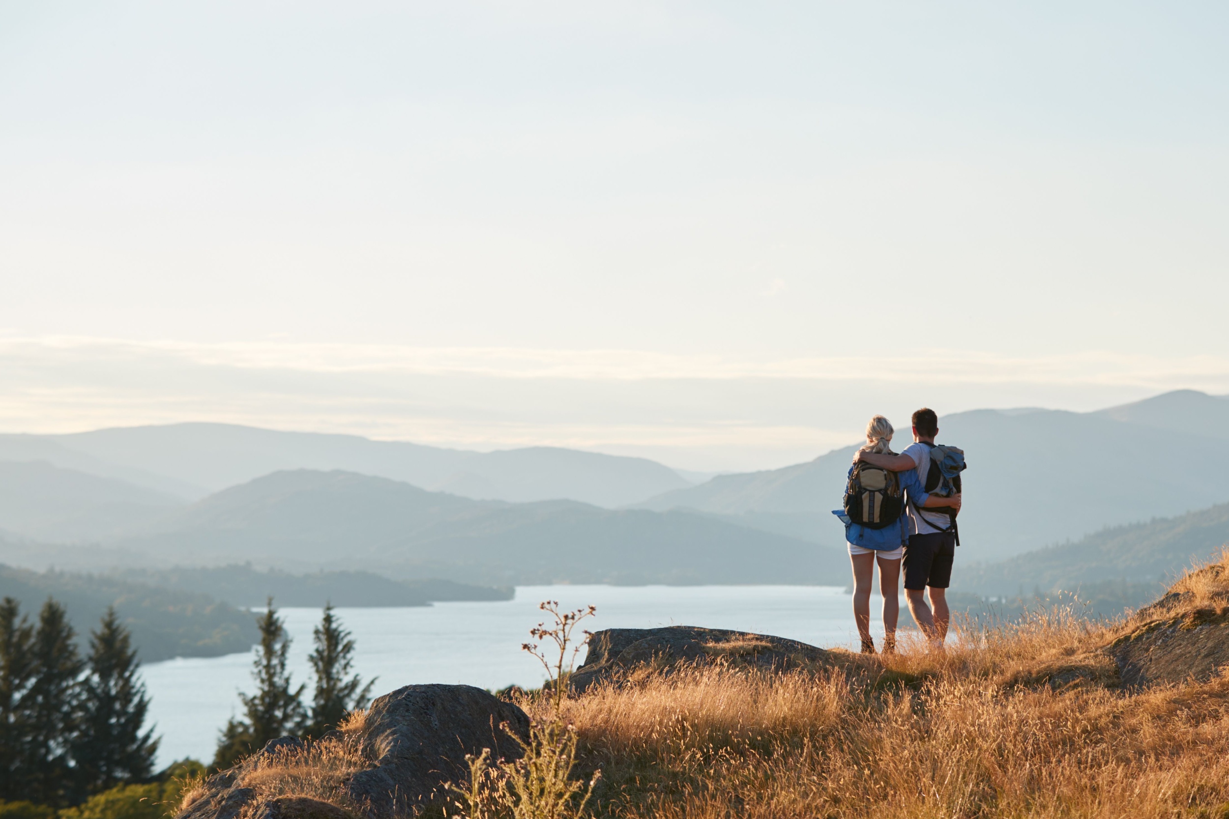 A couple hiking in the Lake District.