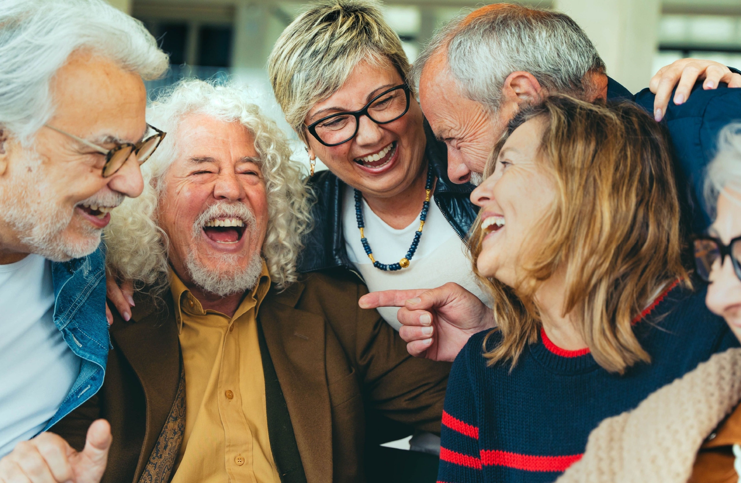 A group of friends laughing together.