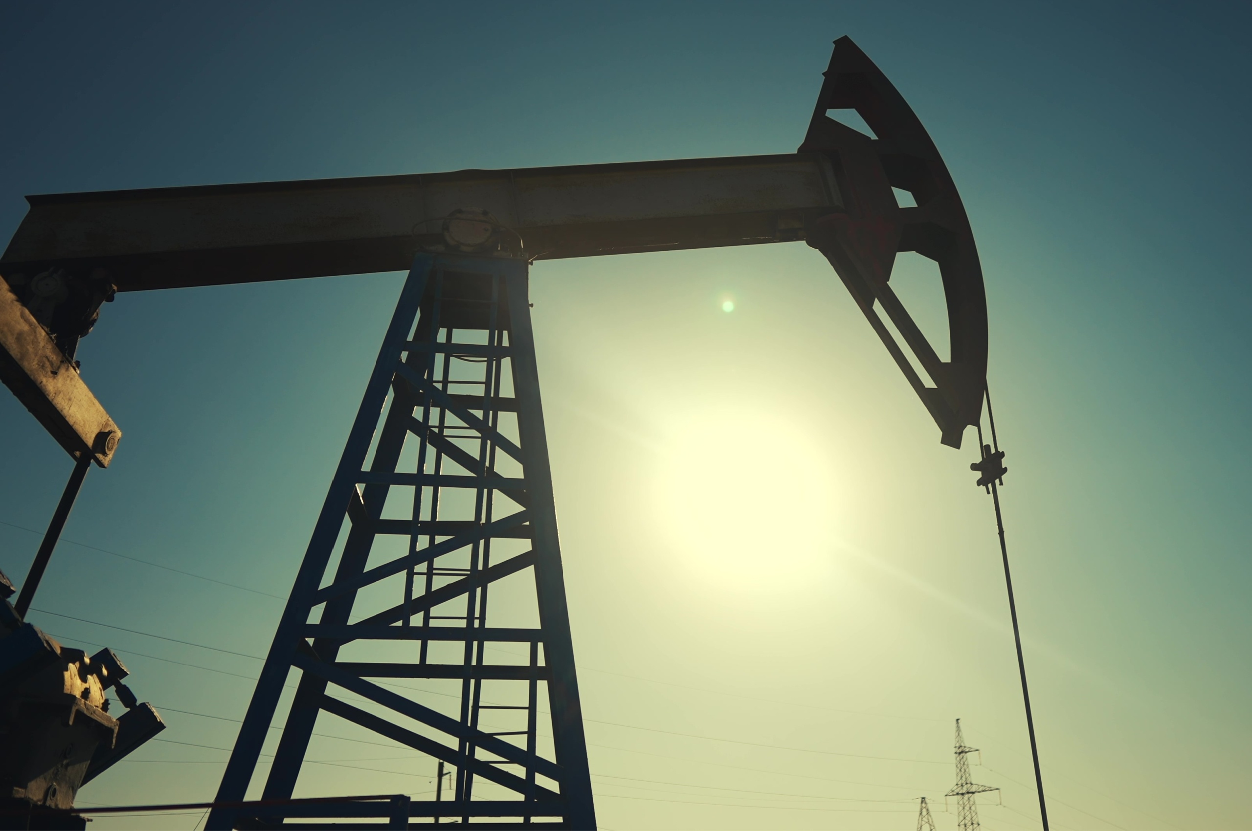 A silhouette of an oil pump.